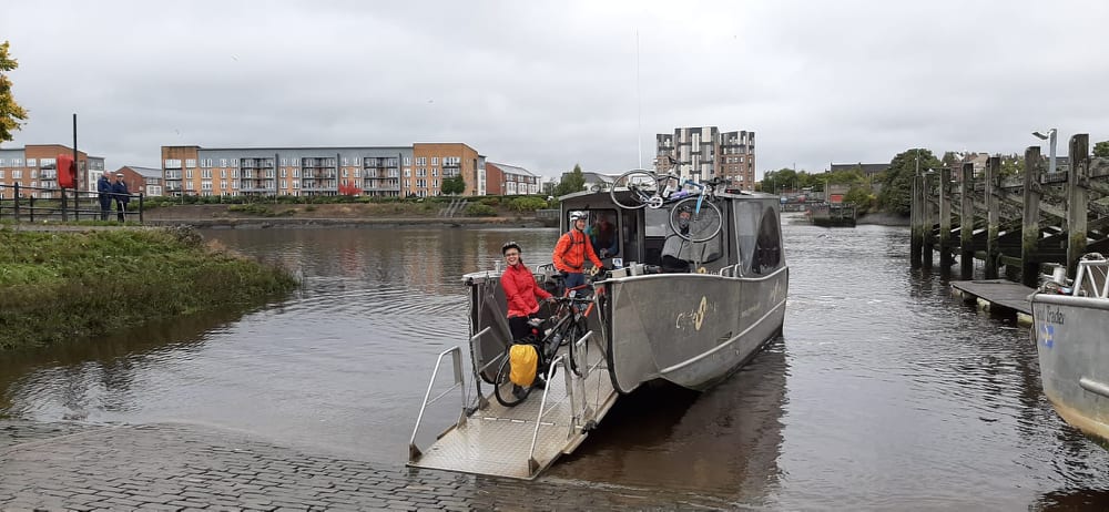 Jeremy, Jane and Zoe with their bicycles on the Renfrew ferry