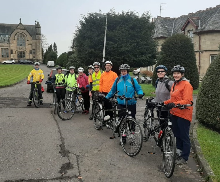 Ten club members and posing with their tandems at Quarriers village